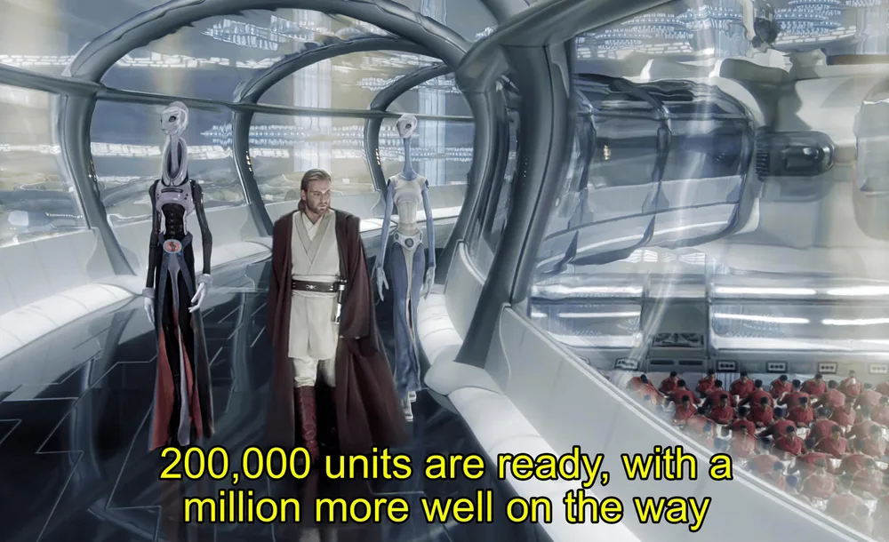Scène de Star Wars dans une navette spatiale futuriste. Obi-Wan Kenobi au
centre portant l'uniforme Jedi (tunique blanche et robe marron), encadré par
deux figures de côté. Baies vitrées montrant une vue de l'espace et des
structures en arrière-plan. Texte en jaune : "200,000 units are ready, with a
million more well on the way". Meme basé sur une scène célèbre du film.